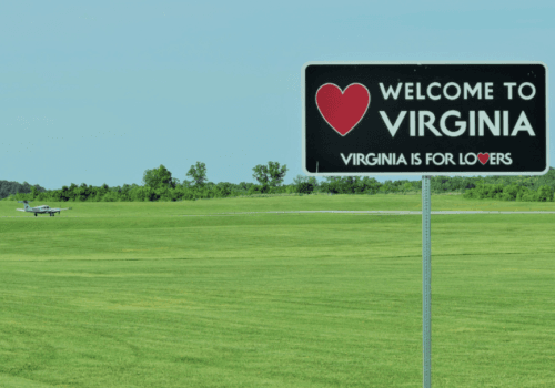 Welcome to Virginia Sign in Front of Airfield